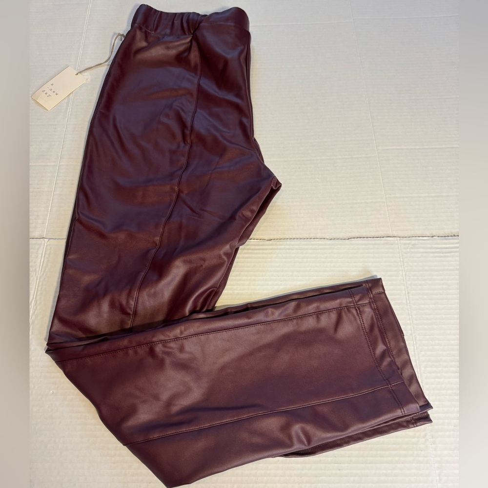 a. New day Women's Faux Leather Pants Burgundy Splits On Sides XL